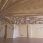 Ivory pleated ceiling decor